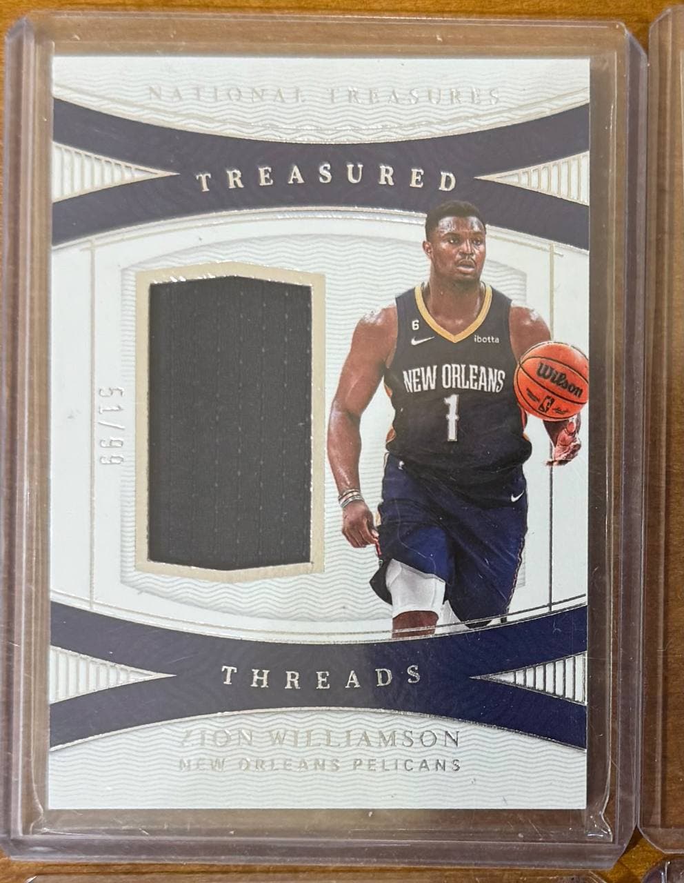 2022–23 Panini National Treasures Treasured Threads #TT-ZWL Zion Williamson /99