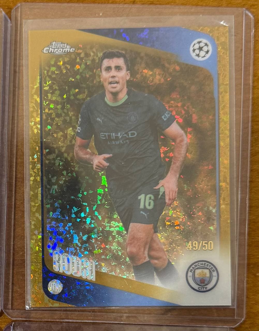 2024–25 Topps Chrome UEFA Club Competitions Gold Lava Refractor #100 Rodri /50